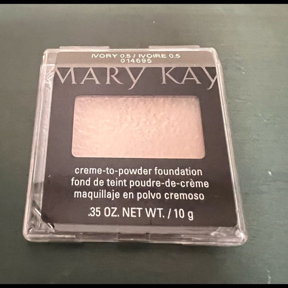 One of Mary Kay cream to powder foundation- ivory 0.5